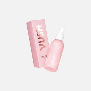 VUSH Clean Queen Intimate Accessory Spray Box and Clean Queen Intimate Accessory Spray product against grey background. Product is a small pink spray bottle with white lid and text.